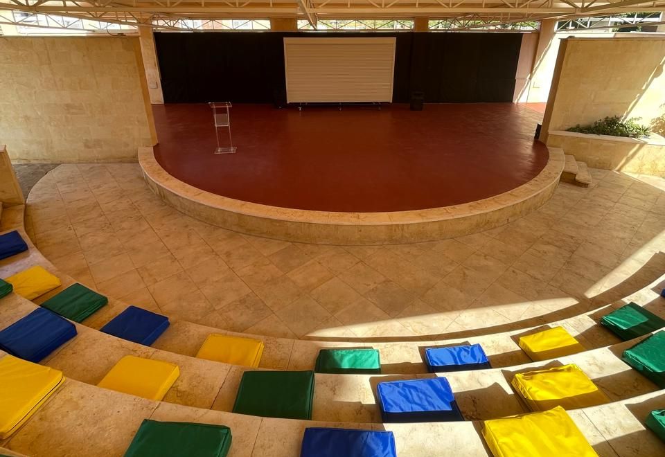 EVO outdoor amphitheater with stage and tiered seating